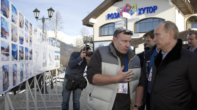 собака