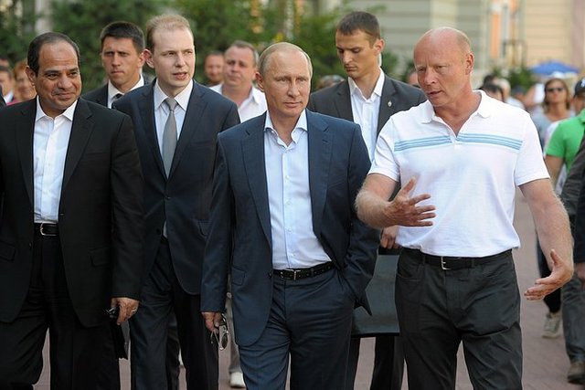 собака